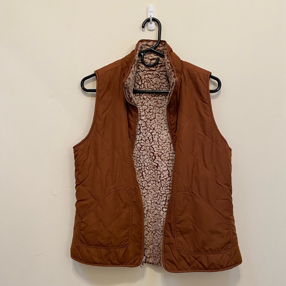 Burnt orange vest with faux fur lining